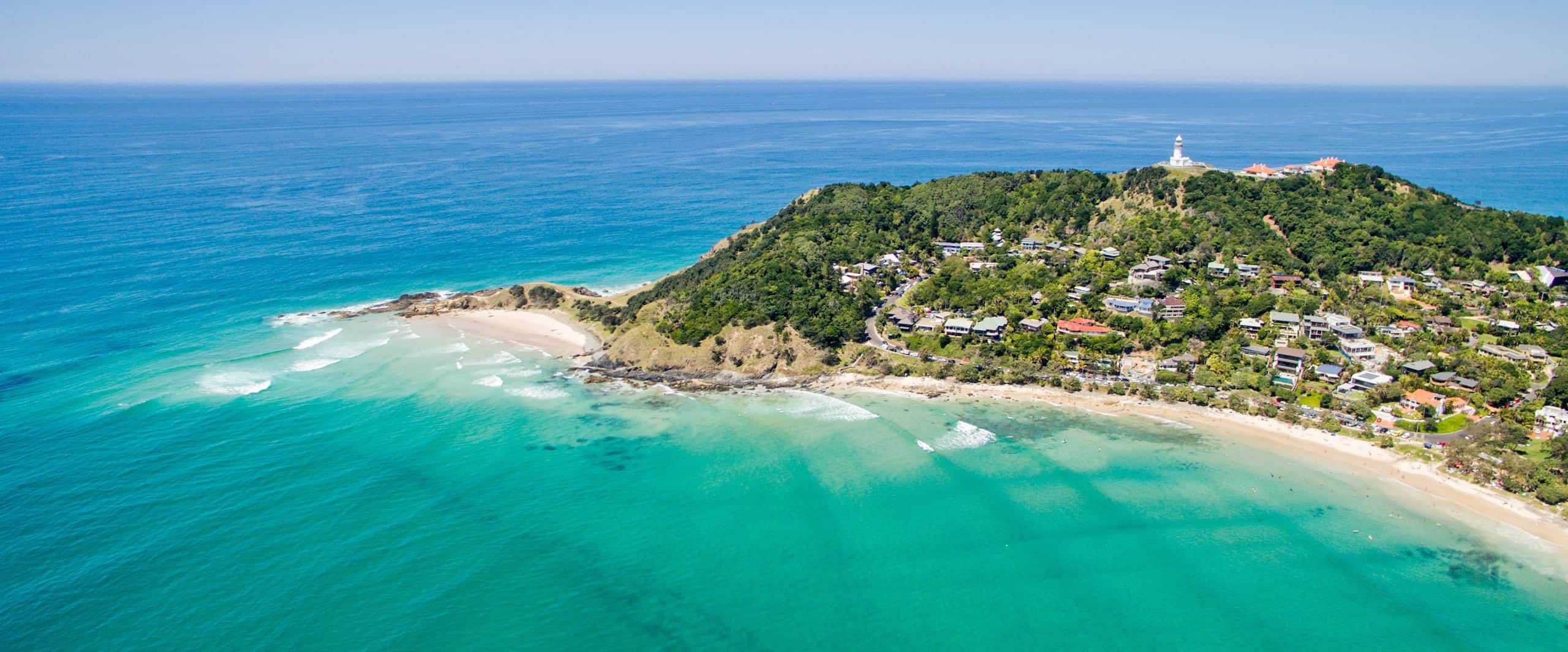 byron bay white fine sand shore aerial view