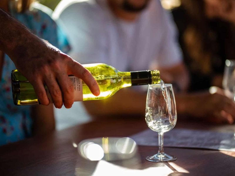 wine glass was filled with wine