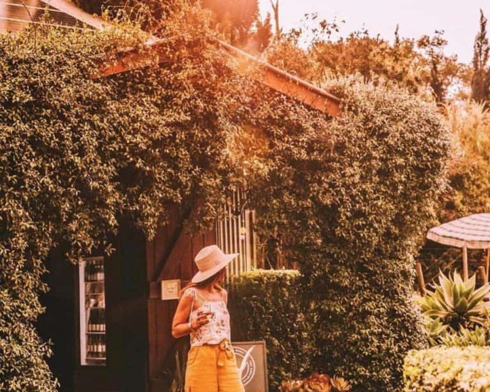 lady outside private boutique wineries