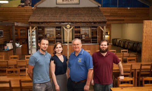 three men and a lady at the winery